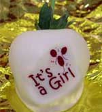 It is a girl chocolate covered strawberries