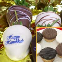 Delivered gift of fancy chocolate covered strawberries with combo item of  mini-cheesecakes decorated for a Happy Hanukkah